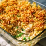 Creamy tuna noodle casserole topped with breadcrumbs and baked to perfection.