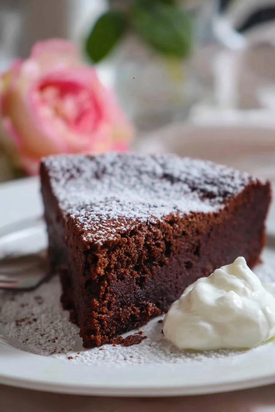 Flourless Chocolate Torte with Cream 3 Delicious Flourless Chocolate Torte topped with cream