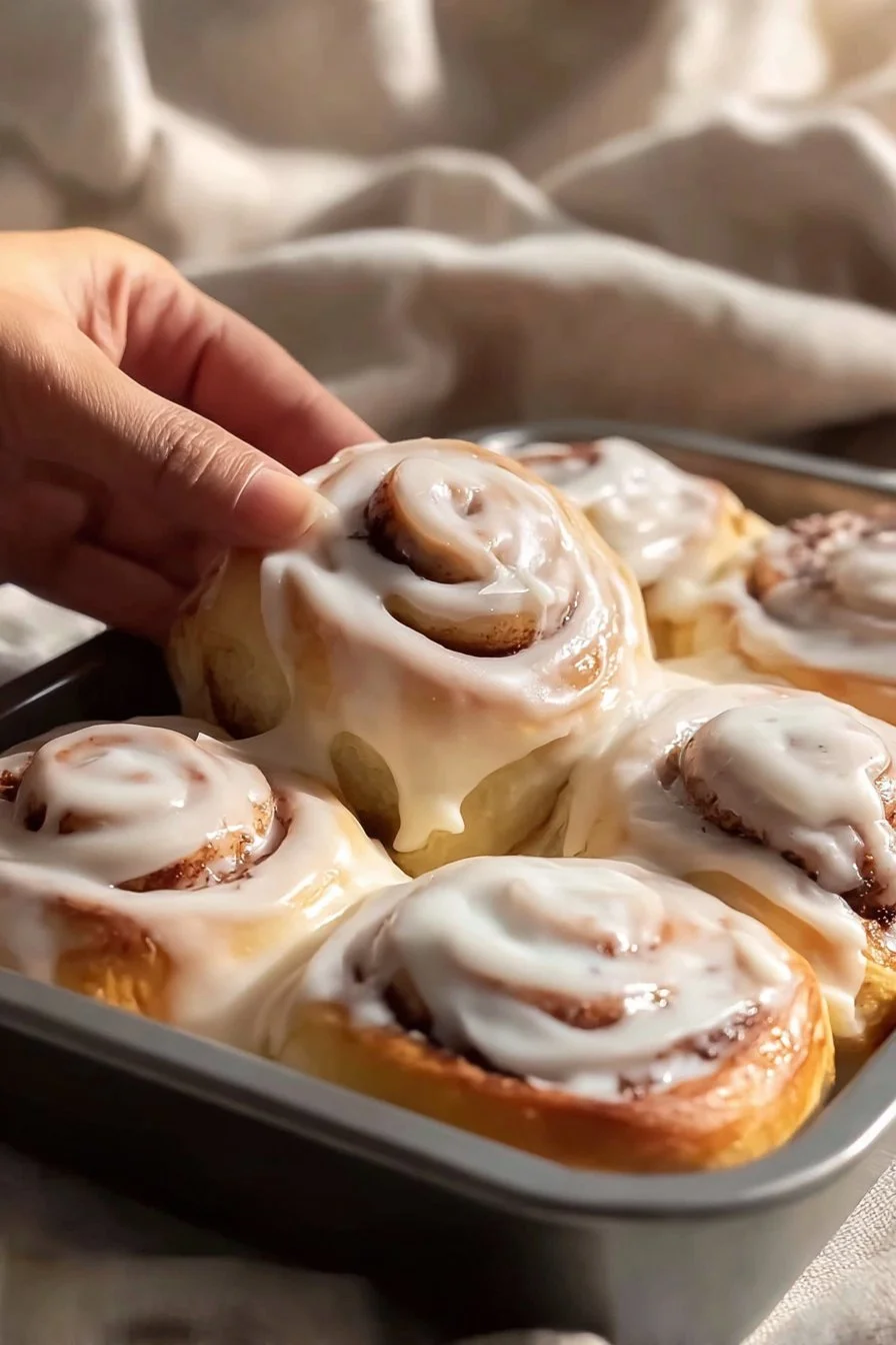 Cinnamon Rolls 3 Delicious homemade cinnamon rolls topped with creamy icing.