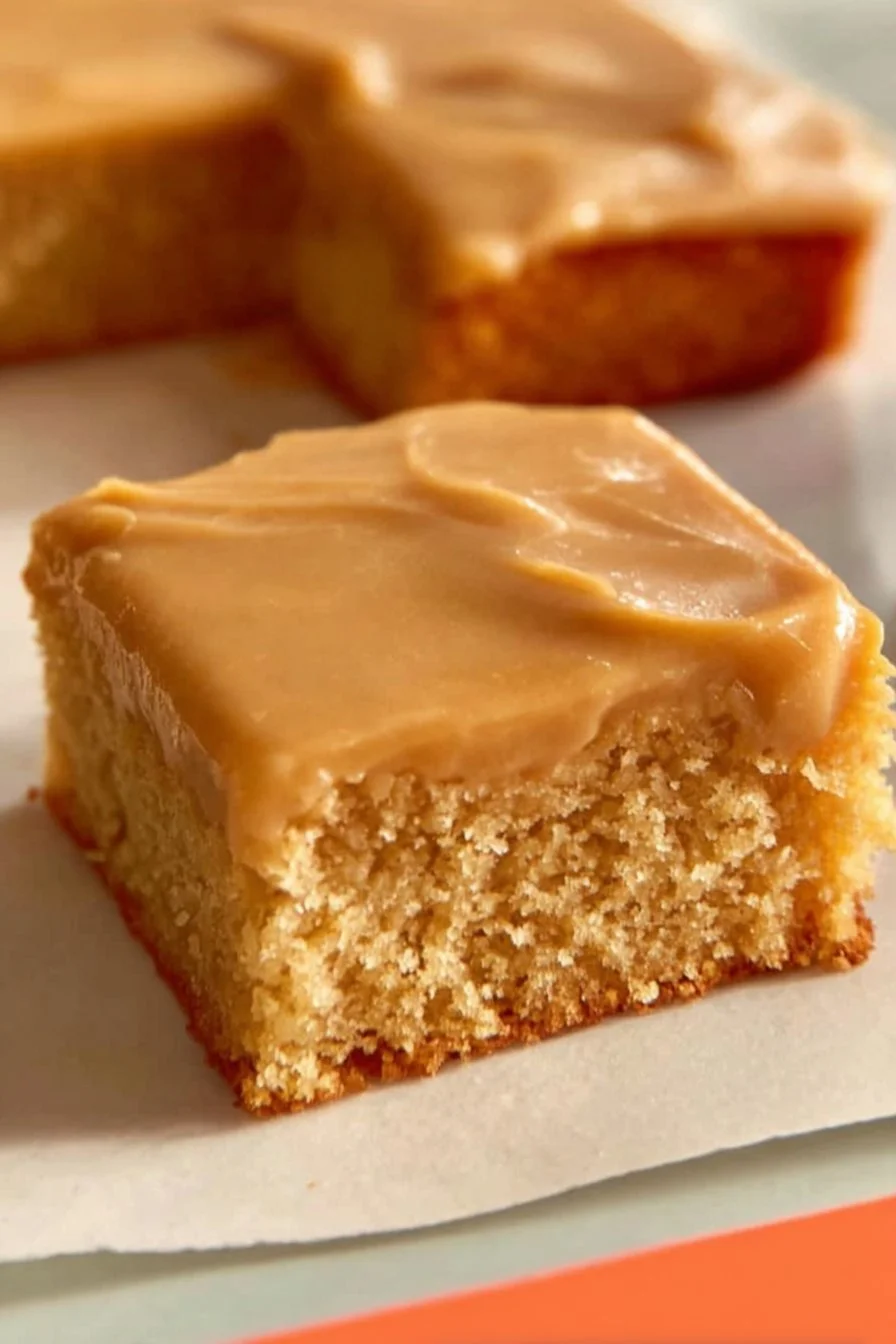 Peanut Butter Sheet Cake 3 Delicious peanut butter sheet cake garnished with peanut butter frosting.