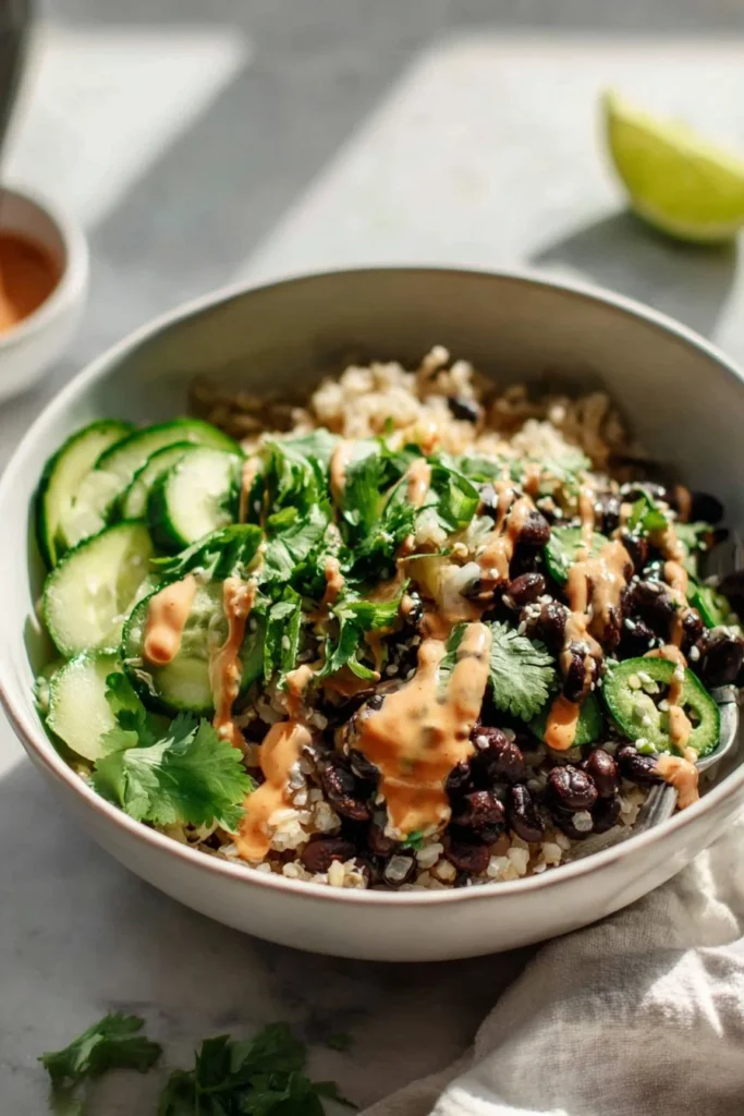 Black Bean Nourish Bowl with Creamy Ginger Sriracha Dressing 2 black bean nourish bowl with creamy ginger srirach 2026 01 23 225116 683x1024 1