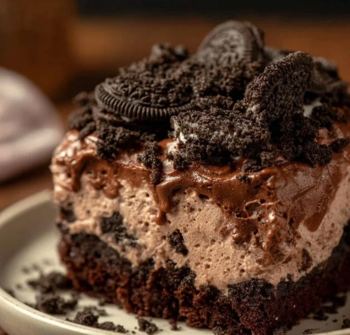 Dirt Cake 3 Delicious dirt cake dessert topped with gummy worms and cookie crumbles