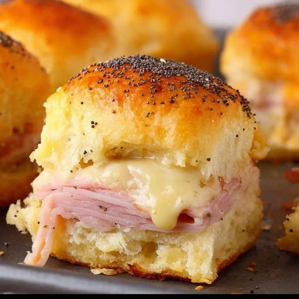 Ham and Havarti Cheese Sliders 3 Plate of Ham Havarti Sliders with melted cheese and ham on fresh buns