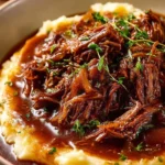 Deliciously juicy French onion pot roast served with vegetables