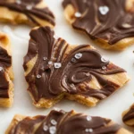 3-Ingredient Frozen Banana Peanut Butter Bark served as a healthy dessert treat.